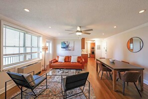 Spacious large living room with a dining table.