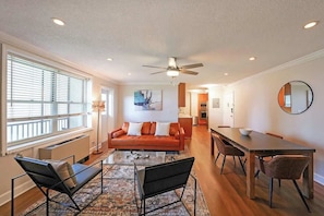 Spacious large living room with a dining table.