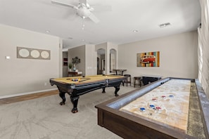 Game on! Challenge your crew to pool, arcade classics, and shuffleboard—fun for all ages awaits!