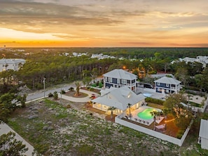 A stunning view of the home's vast, open yard.