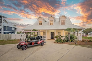 Take your complimentary golf cart on a ride to the beach!