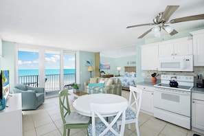 Kitchenette with beach views off slider to balcony