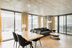 Open-concept living area with cozy seating and natural light.