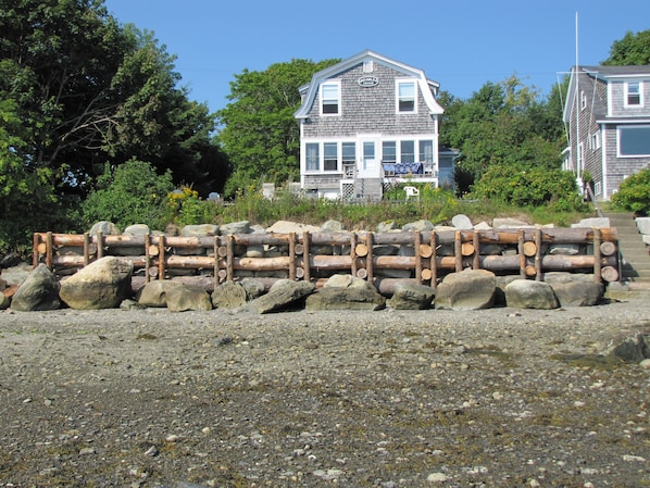 On the shore at low tide.
