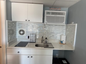 Kitchenette with basic cooking essentials