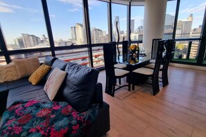Lounge & dining flow out to the private balcony