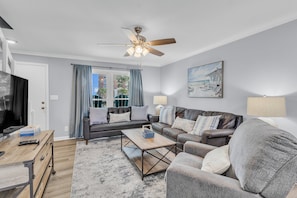 Living room. Sleeper sofa. Sleeps 2. Sand Dollar unit 5. 2 bedrooms. 1.5 bathrooms. Gulf Shores, AL 36542. Managed by Island Rentals.