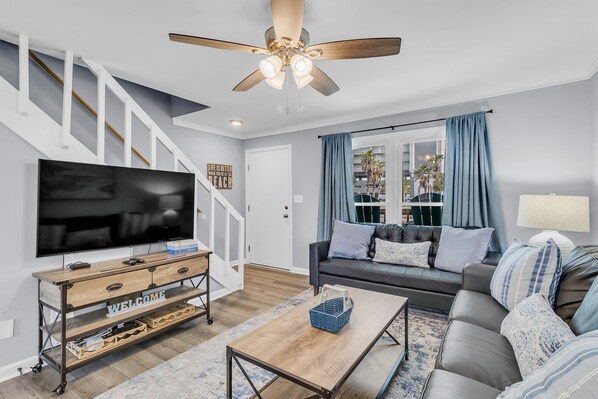Living room. Sleeper sofa. Sleeps 2. Sand Dollar unit 5. 2 bedrooms. 1.5 bathrooms. Gulf Shores, AL 36542. Managed by Island Rentals.