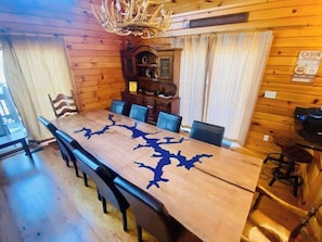 Locally sourced wood table with Deep Creek inlay just custom designed by a local craftsman.