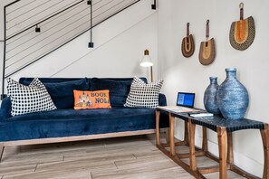 Chic and cozy lounge space with local flair—perfect for kicking back and planning your New Orleans adventures.