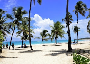 Arena Blanca Beach. 20 minutes walk, or complimentary shuttle transport.
