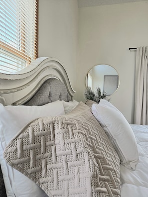 Bedroom1: King, TV, ensuite bathroom, private deck access - third floor.