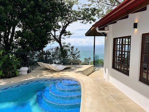 Take a dip in your private pool while enjoying the tropical setting