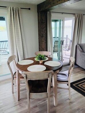 A perfect view out the sliding doors as you dine in the kitchen