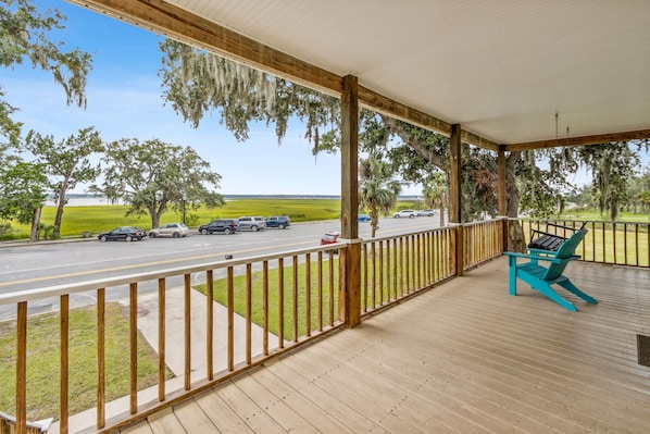 Your Front Porch with Seating and a Swing, Looks out at the St. Marys River and is the Perfect Spot for Peaceful Moments