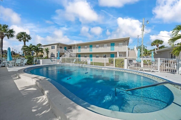 Shared pool right outside your front door.