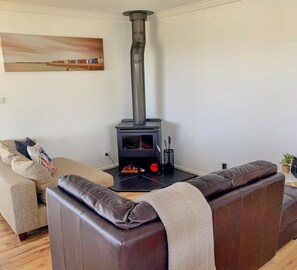 Living area with a fireplace.


