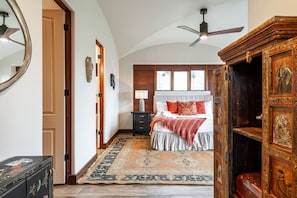 One of 7 serene bedrooms — each designed for restful sleep with cozy linens and calming forest views.
