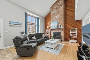 Let the Natural Light and vaulted ceilings welcome you to your Vacation Home!