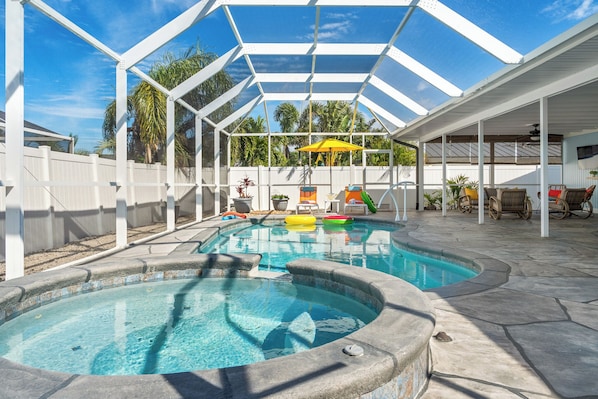 Heated pool, bubbling spa, and plenty of space to relax.