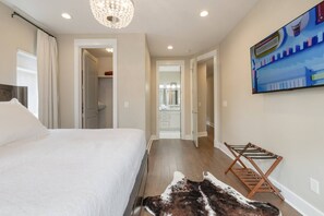 Oversized walk in closet with shelves. 
