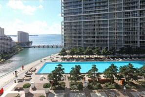 Access exclusive building amenities including the pool, spa, and fitness center to relax and recharge.