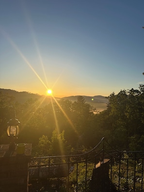 Sun rising from the fire pit area