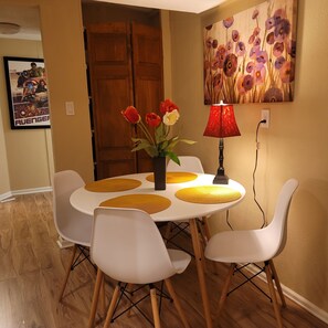 Sit down with friends & family & enjoy a meal or a game night in the dining area