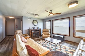 Living Room | Queen Futon | Lake Views | Electric Fireplace | Free WiFi