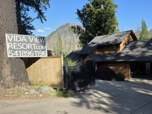 Private/secure: tall fences; lush landscaping; electric driveway gate; cameras