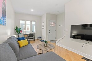 Make yourself at home in our fully furnished and cozy living room with TV for entertainment.