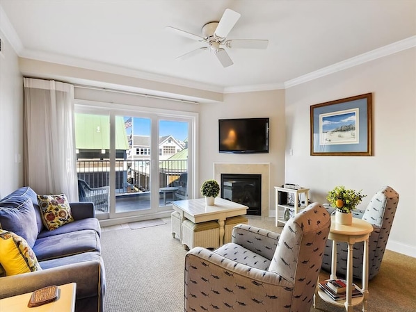 Experience serene oceanfront living in this spacious condo, featuring inviting lounge areas bathed in natural light and direct access to breathtaking ocean views.