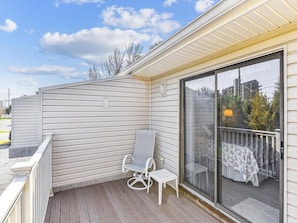 Relax in the comfort of your private outdoor space, ideal for unwinding and connecting with nature just steps away from your cozy living area.