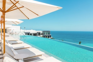 Adults only rooftop infinity pool & bar. Also serves lunch daily.