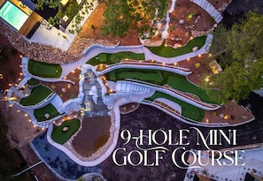 A shared 9 hole mini golf course is nestled right into the hillside—perfect for casual games with a view.