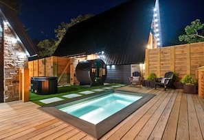 From a quick dip to a leisurely lounge, the plunge pool and turf-lined patio make this space feel like your own private retreat.
