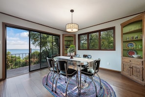 Cozy indoor dining space to enjoy your breakfast with a view of the lake