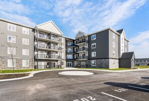 A luxurious 2-bedroom apartment nestled in an upscale, modern building in Dieppe