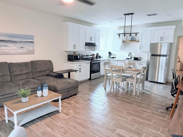 Open floor concept with all new furniture and appliances. 