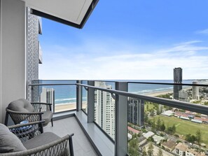 Wake up to a show-stopping view where the city skyline meets the sparkling sea, from your own private balcony off the master bedroom.