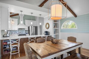 A stylish dining space perfect for shared meals and late-night chats.

