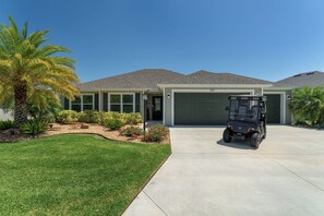 Curb Appeal with 2-Seater Golf Cart for Guest Use!