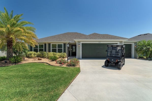 Curb Appeal with 2-Seater Golf Cart for Guest Use!