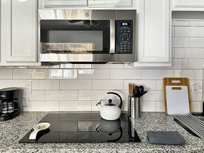 The kitchen’s modern design makes cooking a delightful experience