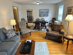 Large living room leads to spacious dining room into the kitchen.