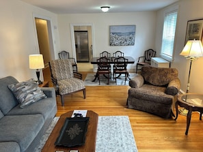 Large living room leads to spacious dining room into the kitchen.