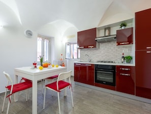 Kitchen Appliance, Kitchen, Furniture, Major Appliance, Flooring, Interior Design, Countertop, Cabinetry, Floor, Home Appliance
