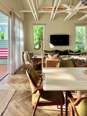 Large balcony doors allow the coastal breeze to flow through the property