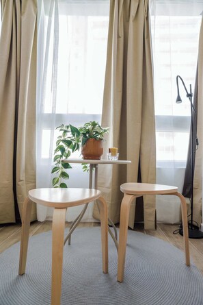 Cozy nook with natural light, perfect for a morning coffee or quiet reading session.