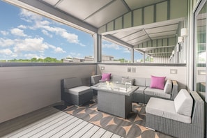 4th Floor: The Covered Deck features outdoor seating surrounding a fire pit.